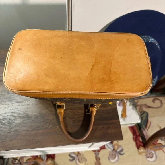 Louis Vuitton Brown and Tan Monogram with strap and keychain charm - Picture 3 of 13